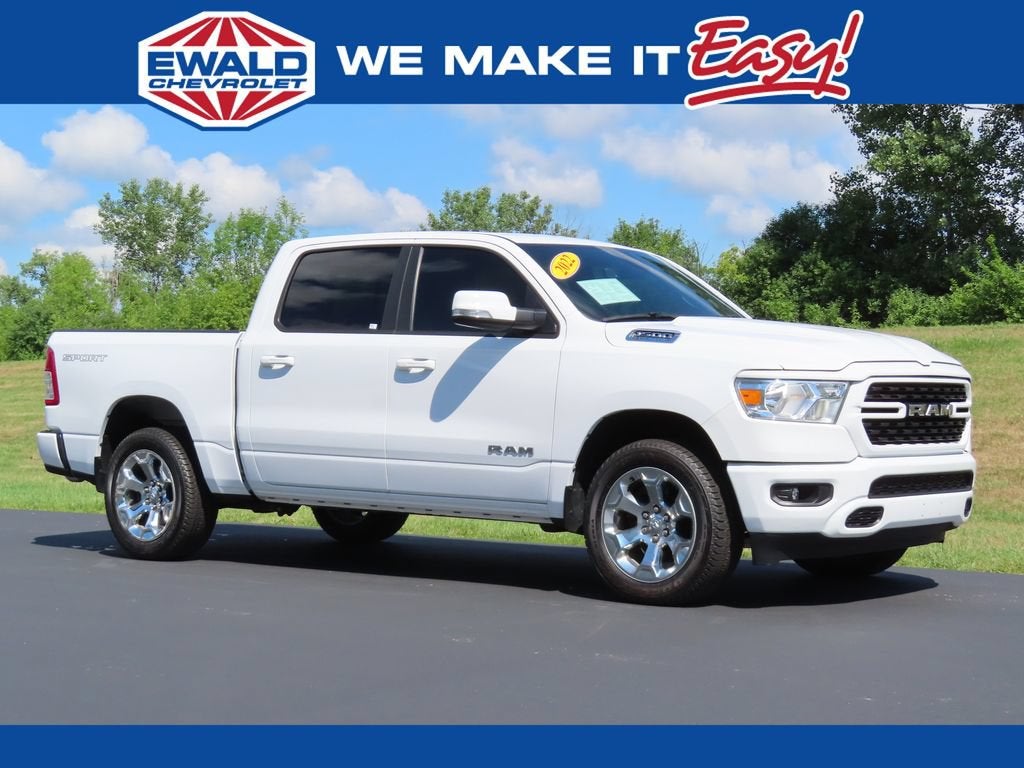 2022 RAM 1500 Big Horn Crew Cab 4x4 5'7" Box in White — front three-quarter view