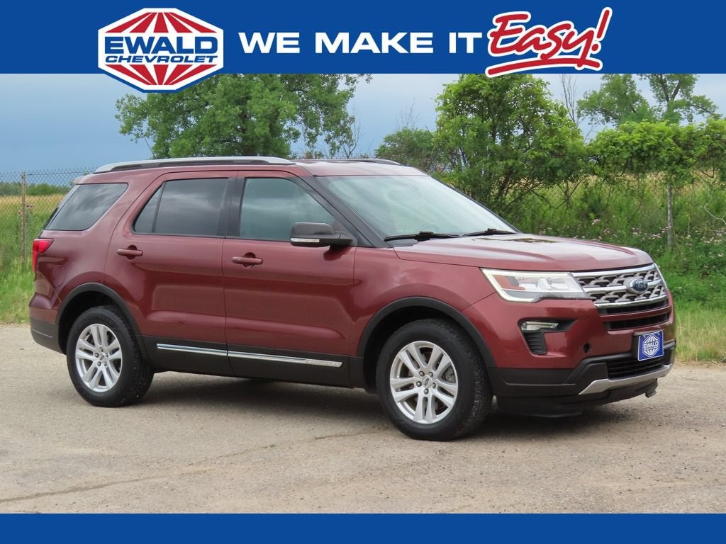 2018 Ford Explorer XLT in Bronze — front three-quarter view