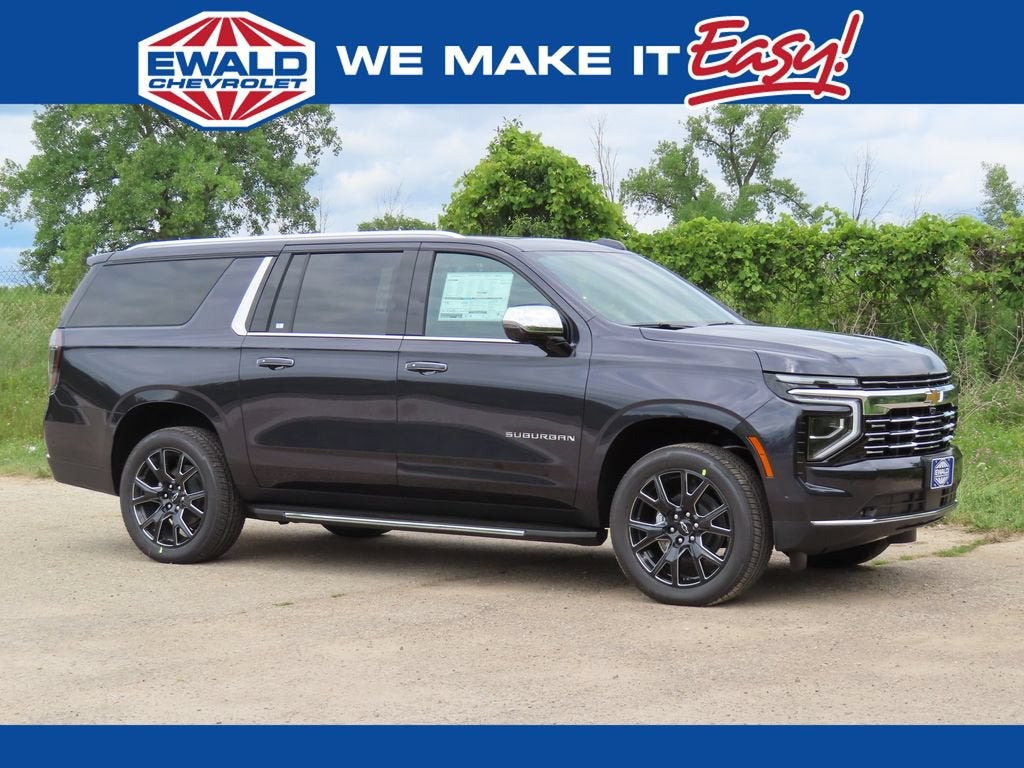 2026 Chevrolet Suburban Premier in Dark Ash Metallic — front three-quarter view