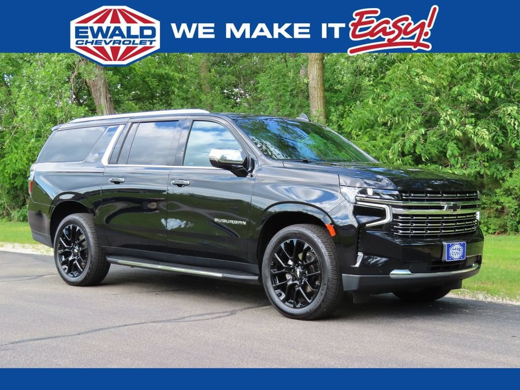 2023 Chevrolet Suburban Premier in Black — front three-quarter view