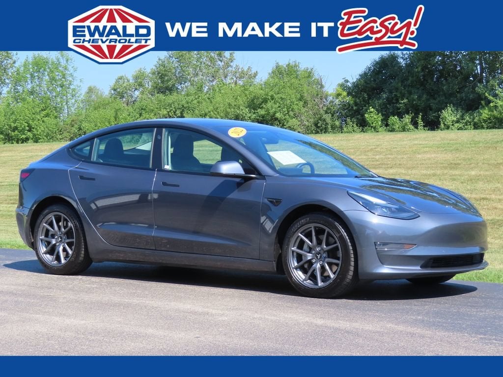 2022 Tesla Model 3 Long Range in Charcoal — front three-quarter view